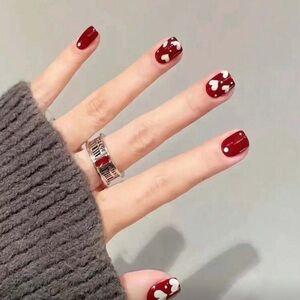 Elegant Red Nail Polish with White Accents 215
